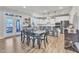 Bright dining area and modern kitchen with stainless steel appliances offer a perfect space for dining and entertaining at 525 Marion Hills Way, Knightdale, NC 27545