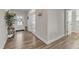 Inviting foyer featuring wood flooring, a decorative wreath, and a charming plant, setting a warm and welcoming tone at 525 Marion Hills Way, Knightdale, NC 27545