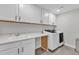 Laundry room featuring plenty of cabinet and counter space at 525 Marion Hills Way, Knightdale, NC 27545