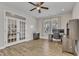 Spacious home office with natural light, wood floors, and ample workspace at 525 Marion Hills Way, Knightdale, NC 27545