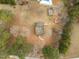 Birds eye view of the beautiful home and backyard, with views of the nearby swimming pool at 582 Pollyanna Rd, Henderson, NC 27537