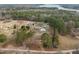 Aerial view of the lake community with beautiful homes, lake access, and in-ground pools at 582 Pollyanna Rd, Henderson, NC 27537