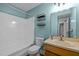Bathroom features a shower and tub combination, single sink vanity, and medicine cabinet at 582 Pollyanna Rd, Henderson, NC 27537