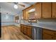 Bright kitchen boasts stainless steel appliances, granite countertops, and an adjacent dining area at 582 Pollyanna Rd, Henderson, NC 27537