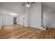 Bright living room featuring vaulted ceilings, hardwood floors, neutral walls, and staircase to the upper level at 582 Pollyanna Rd, Henderson, NC 27537