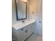 Bright bathroom featuring a vanity with storage at 60 Valebrook Ct, Youngsville, NC 27596