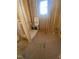 Bathroom under construction, featuring shower construction, framing, and a single window at 60 Valebrook Ct, Youngsville, NC 27596