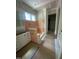 Bathroom remodel showing new shower, white cabinets, and window providing natural light at 60 Valebrook Ct, Youngsville, NC 27596