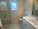 Well-appointed bathroom with glass shower, and bright vanity at 60 Valebrook Ct, Youngsville, NC 27596