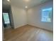 Well-lit bedroom with hardwood floors and views of the neighborhood at 60 Valebrook Ct, Youngsville, NC 27596