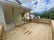 New wooden deck offers an outdoor living space with views of the surrounding neighborhood at 60 Valebrook Ct, Youngsville, NC 27596