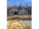 New construction home featuring a covered entry and a gabled roof design at 60 Valebrook Ct, Youngsville, NC 27596