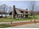 Beautiful outdoor gazebo structure with seating and stone pillars near a pond at 60 Valebrook Ct, Youngsville, NC 27596