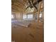 Spacious living room under construction, featuring natural light and a fireplace at 60 Valebrook Ct, Youngsville, NC 27596