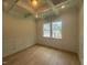 A bright office space with coffered ceiling, wainscotting and large windows at 60 Valebrook Ct, Youngsville, NC 27596