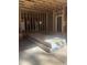 Unfinished room with framed walls ready for drywall installation at 60 Valebrook Ct, Youngsville, NC 27596