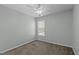 Cozy bedroom featuring a ceiling fan and a window providing natural light at 613 Flaherty Ave, Wake Forest, NC 27587