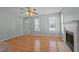 Spacious living area with fireplace, neutral paint, and laminate flooring at 613 Flaherty Ave, Wake Forest, NC 27587