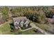 A peaceful home nestled amidst verdant trees, the property showcases impeccable landscaping at 690 Hawthorne Pl, Creedmoor, NC 27522