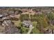 Spacious home on a large lot with mature trees and a long driveway, providing privacy and seclusion at 690 Hawthorne Pl, Creedmoor, NC 27522