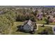 Home on a large lot with lush trees and private driveway, providing a tranquil living environment at 690 Hawthorne Pl, Creedmoor, NC 27522