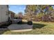 The property features an expansive backyard with a grill and outdoor entertaining space at 690 Hawthorne Pl, Creedmoor, NC 27522