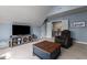 Bonus room featuring seating, tv, storage and great natural light at 690 Hawthorne Pl, Creedmoor, NC 27522