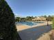 Community pool featuring a bathhouse with covered seating and lounge chairs surrounding the water at 690 Hawthorne Pl, Creedmoor, NC 27522