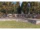 Stone neighborhood sign and landscaping welcomes you to Hawthorne at 690 Hawthorne Pl, Creedmoor, NC 27522