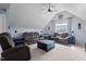 Spacious living room with vaulted ceiling, comfortable seating, and natural light at 690 Hawthorne Pl, Creedmoor, NC 27522