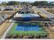 Aerial view of community pool, pickleball court and clubhouse at 720 Shell Bank Ct, Cary, NC 27519