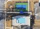 Aerial view of the community pool, clubhouse and tennis court at 720 Shell Bank Ct, Cary, NC 27519