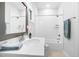 Well-lit bathroom featuring a bright vanity, showerhead and bathtub at 720 Shell Bank Ct, Cary, NC 27519