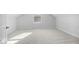 Spacious bedroom with neutral carpet and bright natural light at 720 Shell Bank Ct, Cary, NC 27519