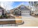 Charming single-Gathering home featuring a two-car garage, stone accents, and well-maintained landscaping at 720 Shell Bank Ct, Cary, NC 27519