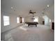 Spacious game room featuring a pool table, multiple ceiling fans and recessed lighting at 8510 Polaris Dr, Bahama, NC 27503