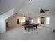 Large game room with a pool table, shelving, ceiling fans and great lighting at 8510 Polaris Dr, Bahama, NC 27503