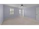 Bedroom with carpet, ceiling fan, neutral paint and plantation shutters at 8712 New River Cir, Raleigh, NC 27603