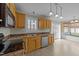 Well-lit kitchen with modern appliances and a breakfast nook with bay window at 8712 New River Cir, Raleigh, NC 27603