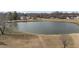 Scenic view of the pond and surrounding neighborhood in the community at 8712 New River Cir, Raleigh, NC 27603