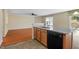 Bright kitchen with stainless steel dishwasher and light wood cabinets and granite countertops at 904 Churchill Glen Blvd, Knightdale, NC 27545