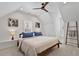 Stylish bedroom with a vaulted ceiling, recessed lighting, and a neutral color palette at 907 Vintage Hill Pkwy, Durham, NC 27712