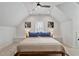 Stylish bedroom with a vaulted ceiling, recessed lighting, and a neutral color palette at 907 Vintage Hill Pkwy, Durham, NC 27712