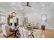Inviting living room with a stone fireplace and abundant natural light creates a warm atmosphere at 907 Vintage Hill Pkwy, Durham, NC 27712