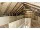 An unfinished attic featuring exposed rafters at 9244 Palm Bay Cir, Raleigh, NC 27617