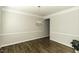 Elegant dining room featuring hardwood floors and stylish lighting fixture at 9244 Palm Bay Cir, Raleigh, NC 27617