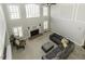 Bright living room with fireplace and vaulted ceiling at 9244 Palm Bay Cir, Raleigh, NC 27617