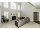 Inviting living room showcasing a fireplace, high ceilings, and comfortable seating at 9244 Palm Bay Cir, Raleigh, NC 27617