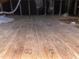 Spacious attic area with wood flooring and exposed rafters ready for storage at 103 W Thorndale Dr, Oxford, NC 27565