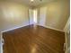 Bedroom with hardwood floors, neutral walls, and natural light at 103 W Thorndale Dr, Oxford, NC 27565